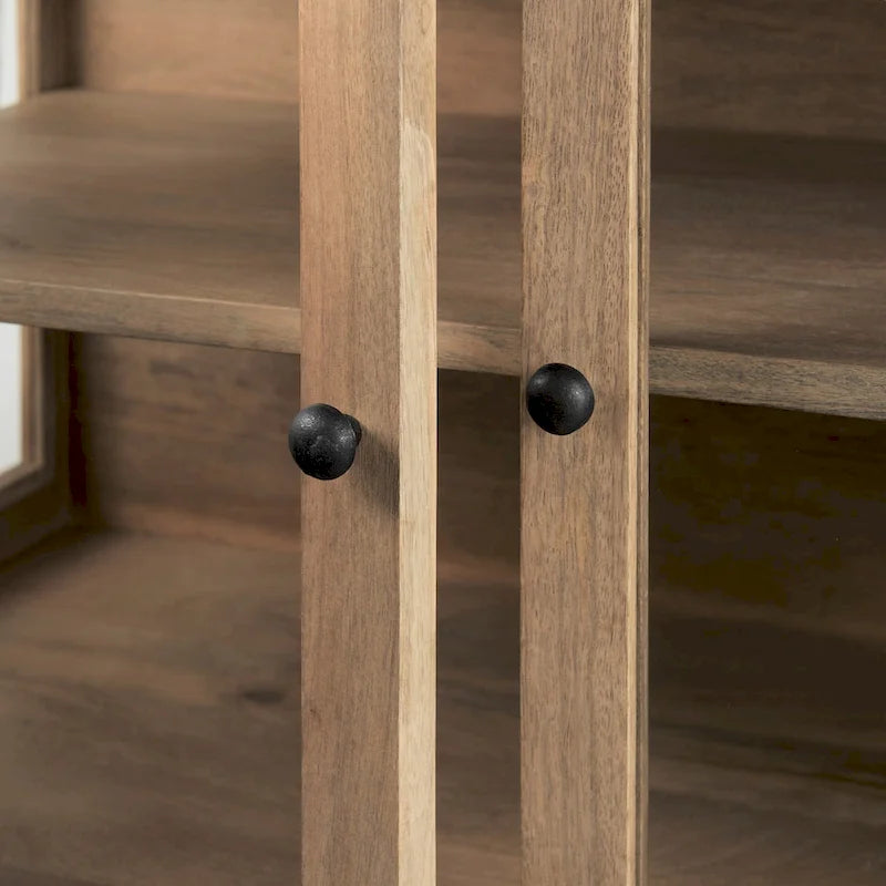 Accentkast van massief hout met zwart ijzeren frame en glazen deuren